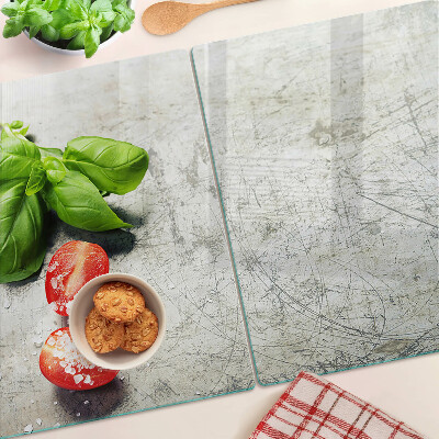 Glass chopping board Tomatoes with basil and salt