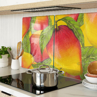 Chopping board glass Peppers on a background of green leaves