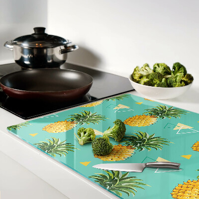 Chopping board glass Pineapples on a turquoise background