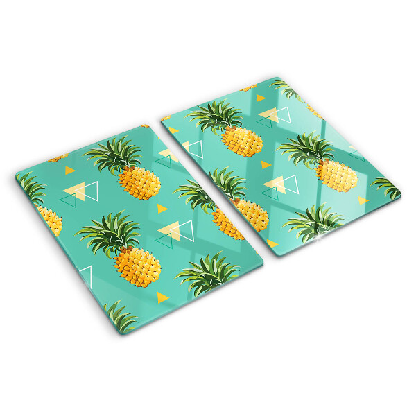 Chopping board glass Pineapples on a turquoise background