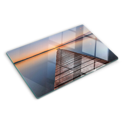 Chopping board Pier on the lake at sunset