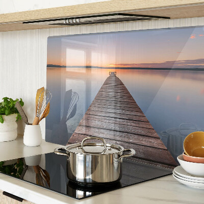 Chopping board Pier on the lake at sunset