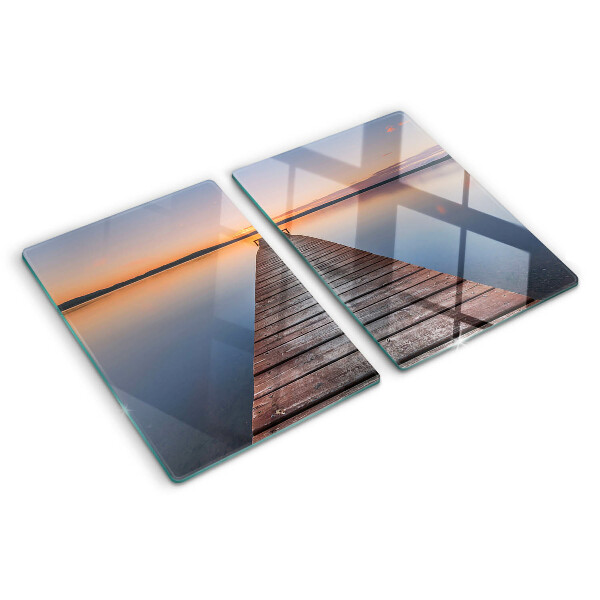 Chopping board Pier on the lake at sunset