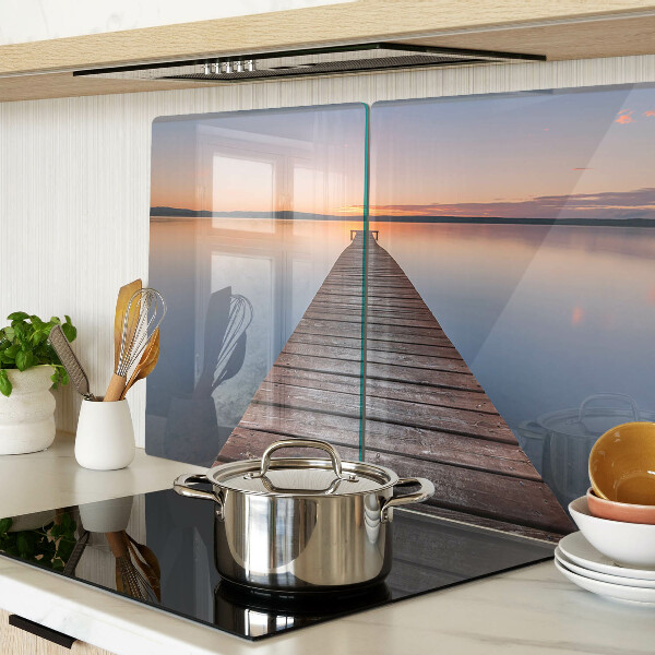 Chopping board Pier on the lake at sunset