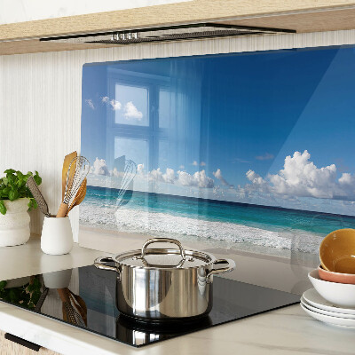 Glass kitchen board A beach with turquoise water and clouds