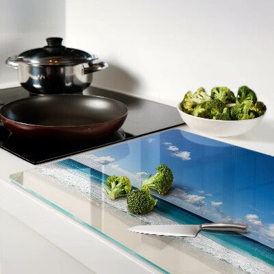 Glass kitchen board A beach with turquoise water and clouds