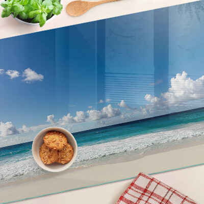Glass kitchen board A beach with turquoise water and clouds