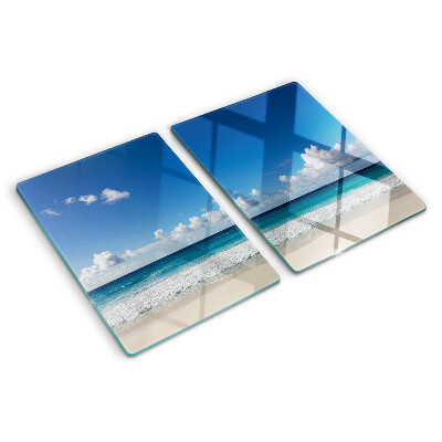 Glass kitchen board A beach with turquoise water and clouds