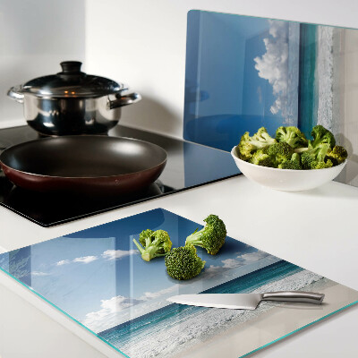 Glass kitchen board A beach with turquoise water and clouds