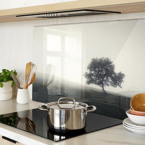 Chopping board A tree in a foggy landscape