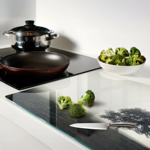 Chopping board A tree in a foggy landscape