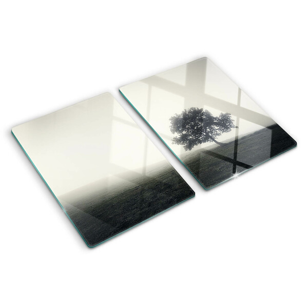 Chopping board A tree in a foggy landscape