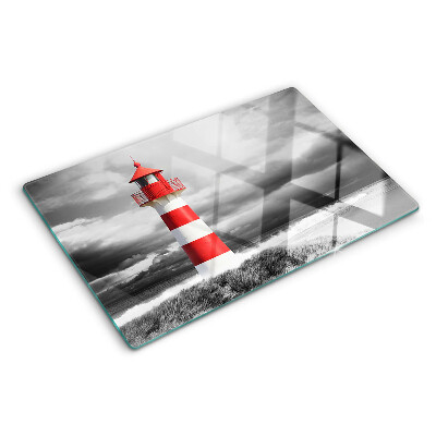 Glass chopping board A lighthouse in the landscape