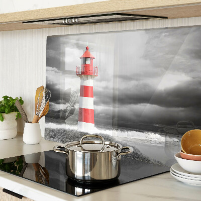 Glass chopping board A lighthouse in the landscape