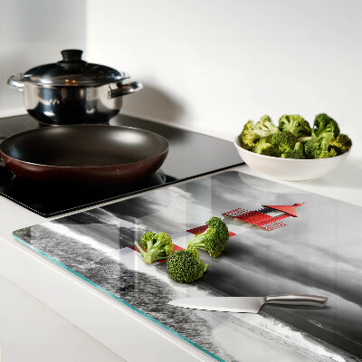 Glass chopping board A lighthouse in the landscape