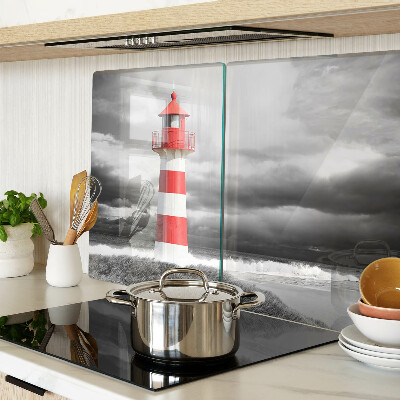 Glass chopping board A lighthouse in the landscape