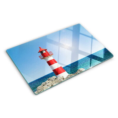 Glass cutting board A lighthouse over the ocean