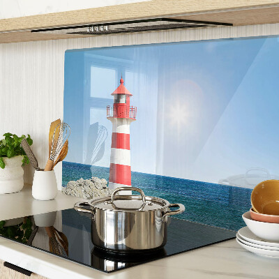 Glass cutting board A lighthouse over the ocean