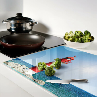 Glass cutting board A lighthouse over the ocean