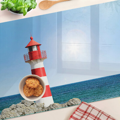 Glass cutting board A lighthouse over the ocean