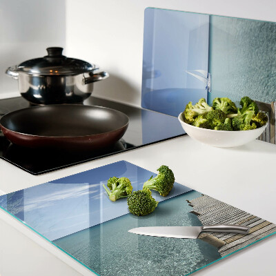 Glass kitchen board Pier over the turquoise sea