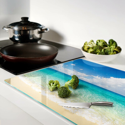 Chopping board glass A beach with turquoise water and clouds