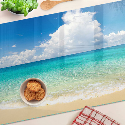 Chopping board glass A beach with turquoise water and clouds