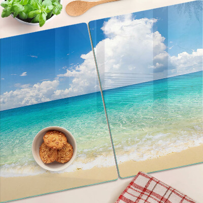 Chopping board glass A beach with turquoise water and clouds