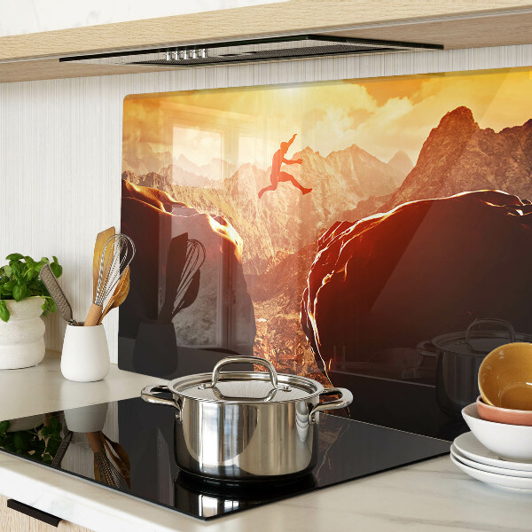 Glass chopping board Jumping in the mountains at sunset