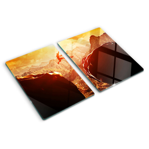Glass chopping board Jumping in the mountains at sunset
