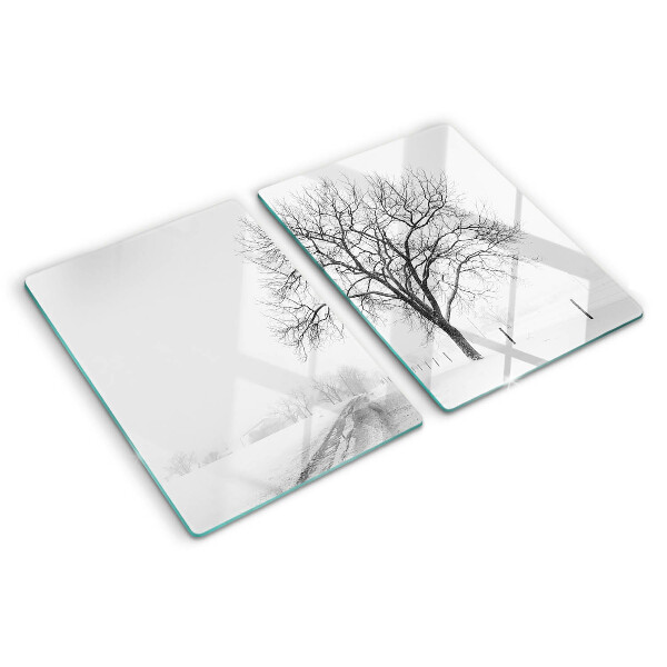 Glass kitchen board Empty winter landscape with a tree