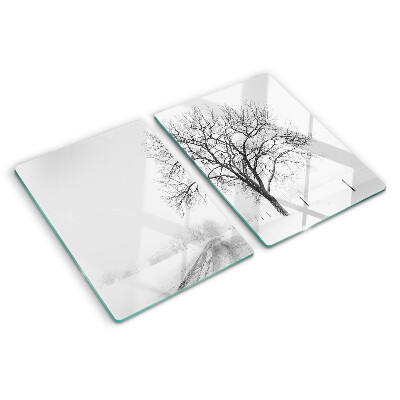 Glass kitchen board Empty winter landscape with a tree