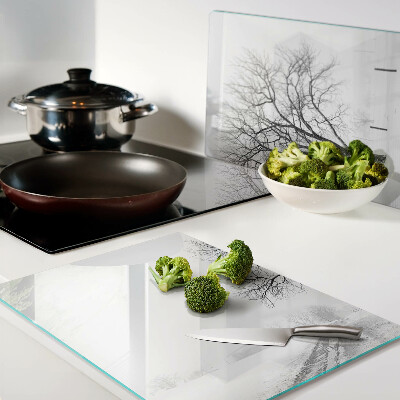 Glass kitchen board Empty winter landscape with a tree