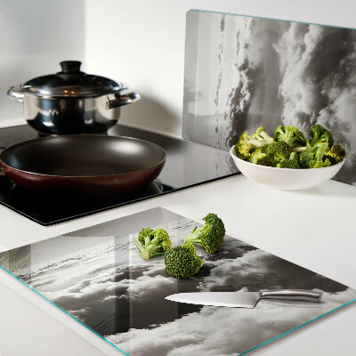 Chopping board glass Clouds in shades of gray