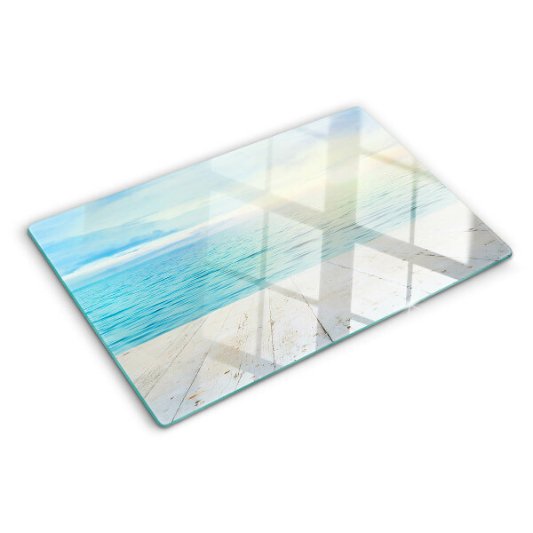 Glass cutting board The sea and the wooden jetty