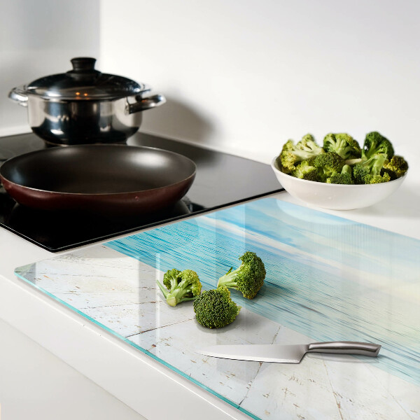 Glass cutting board The sea and the wooden jetty