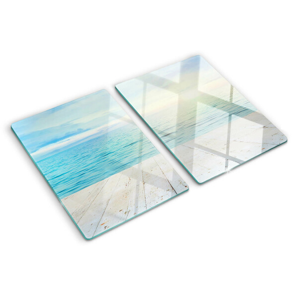 Glass cutting board The sea and the wooden jetty