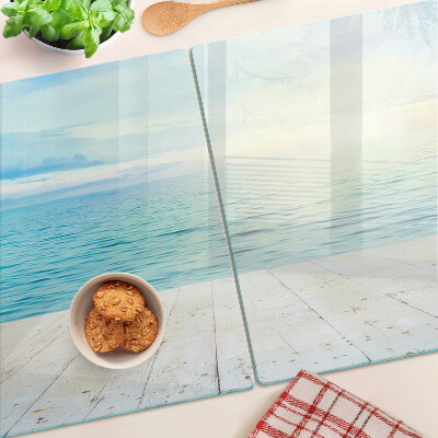 Glass cutting board The sea and the wooden jetty