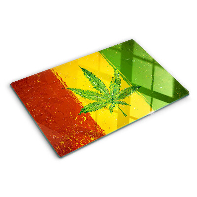 Glass cutting board Cannabis leaf on a colorful background