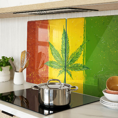Glass cutting board Cannabis leaf on a colorful background