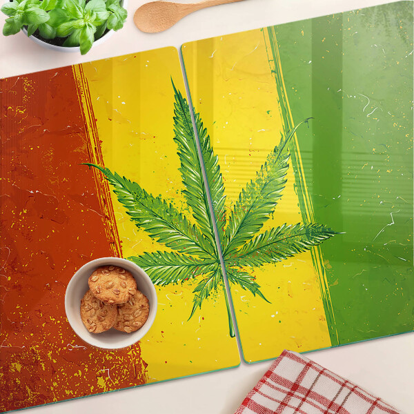 Glass cutting board Cannabis leaf on a colorful background
