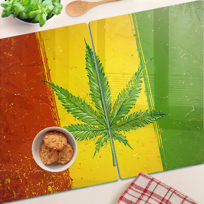 Glass cutting board Cannabis leaf on a colorful background