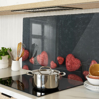 Glass chopping board Red hearts on a dark background