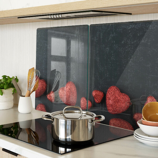 Glass chopping board Red hearts on a dark background
