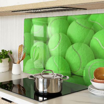 Cutting board Tennis balls on a green background