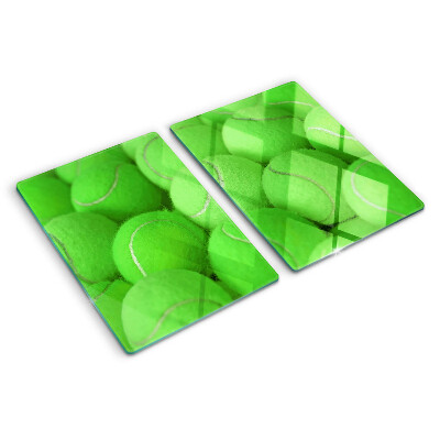 Cutting board Tennis balls on a green background
