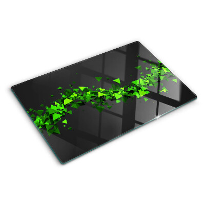 Glass kitchen board Green triangles on a black background