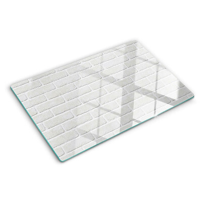 Glass chopping board Brick wall