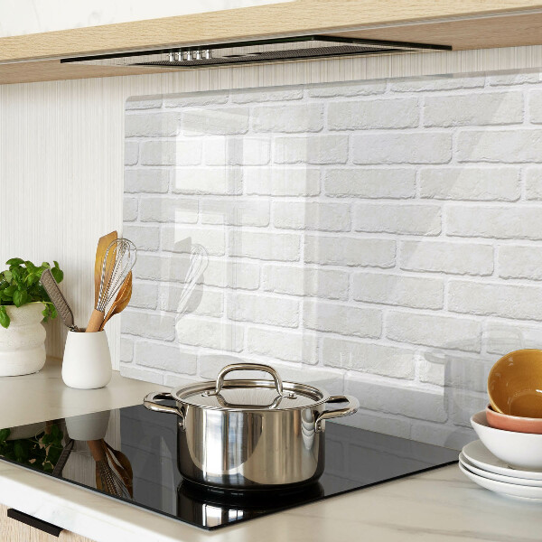 Glass chopping board Brick wall