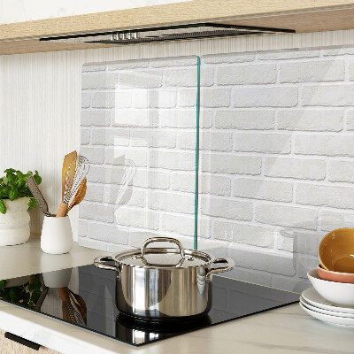Glass chopping board Brick wall